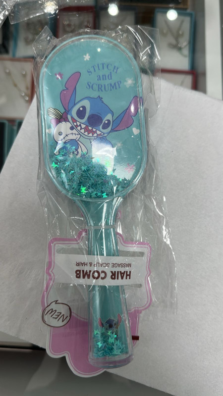 Stitch hair comb